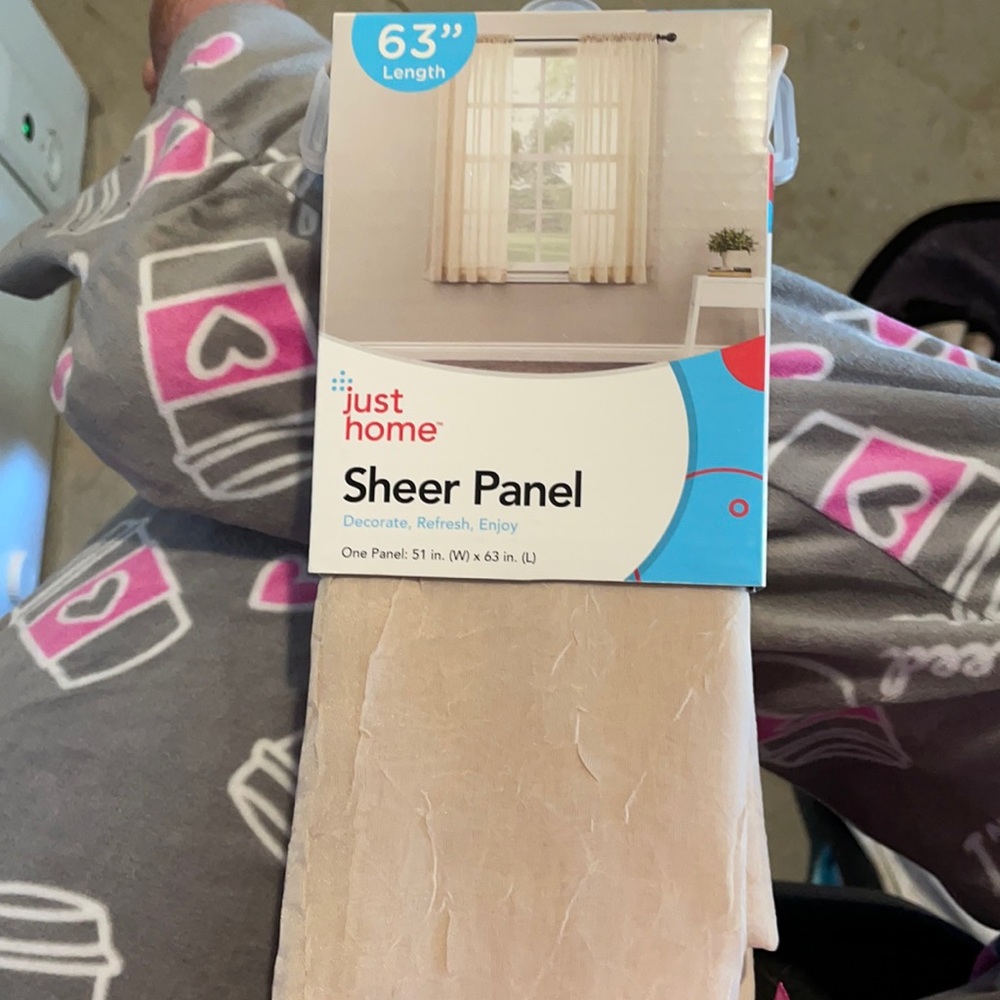 1 sheer panel in a creamy tan. 51 in x 63 in